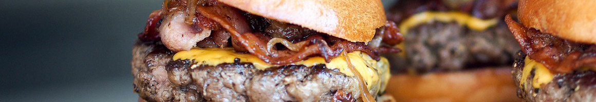 Eating American (Traditional) Burger at Burgers & Barley Park City restaurant in Park City, UT.